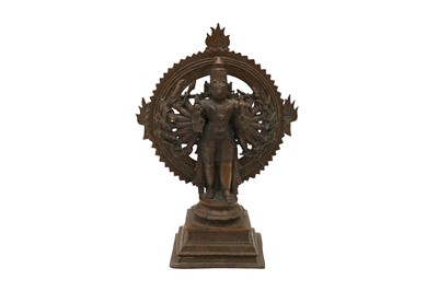 Lot 344 - A 19TH CENTURY INDIAN BRONZE MULTIARMED SHIVA IN THE TANDAVA CIRCLE OF FIRE