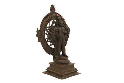 Lot 344 - A 19TH CENTURY INDIAN BRONZE MULTIARMED SHIVA IN THE TANDAVA CIRCLE OF FIRE