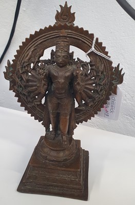 Lot 344 - A 19TH CENTURY INDIAN BRONZE MULTIARMED SHIVA IN THE TANDAVA CIRCLE OF FIRE