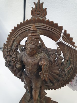 Lot 344 - A 19TH CENTURY INDIAN BRONZE MULTIARMED SHIVA IN THE TANDAVA CIRCLE OF FIRE