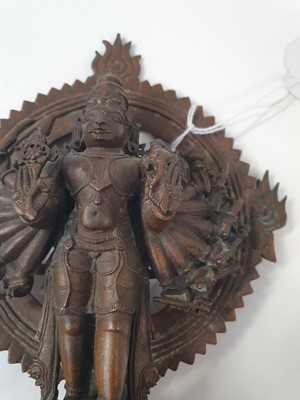 Lot 344 - A 19TH CENTURY INDIAN BRONZE MULTIARMED SHIVA IN THE TANDAVA CIRCLE OF FIRE