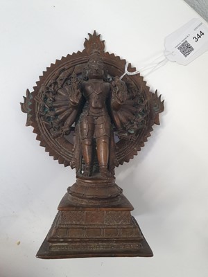 Lot 344 - A 19TH CENTURY INDIAN BRONZE MULTIARMED SHIVA IN THE TANDAVA CIRCLE OF FIRE