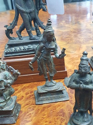 Lot 343 - A MISCELLANEOUS GROUP OF BRONZE HINDU AND BUDDHIST STATUETTES