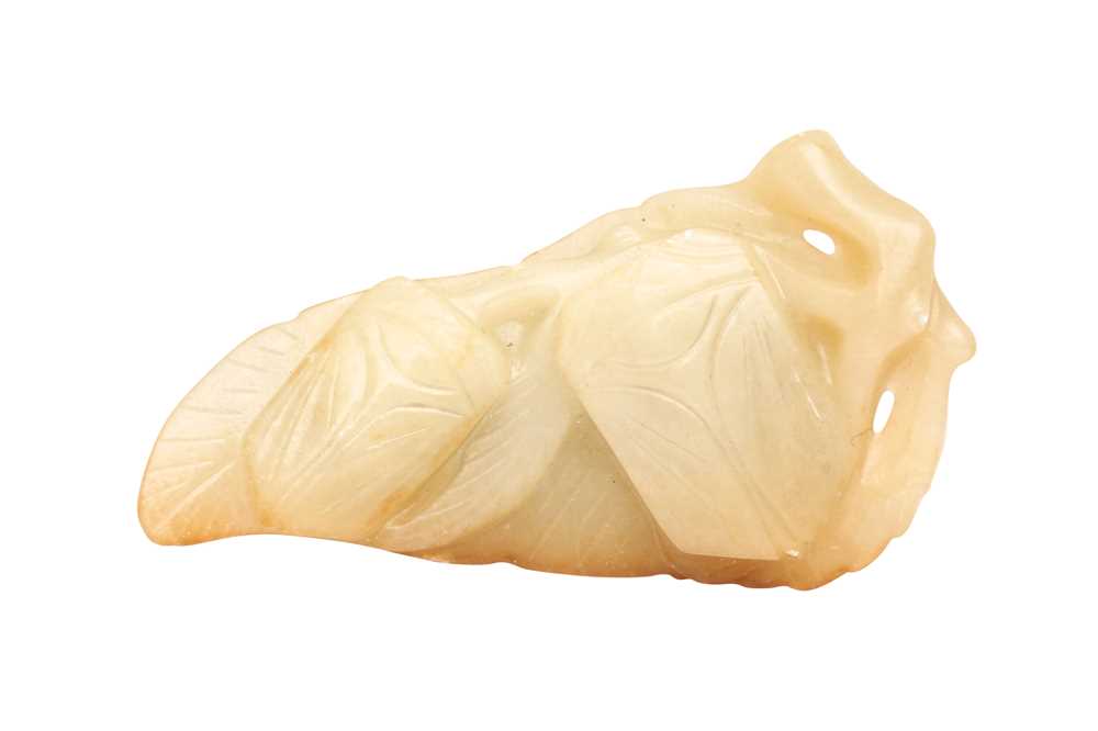 Lot 169 - A CHINESE JADE 'CICADAS' CARVING