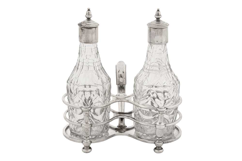 Lot 478 - A Queen Anne Britannia standard silver oil and vinegar cruet, London 1709 by Simon Pantin I (reg. 23rd June 1701)