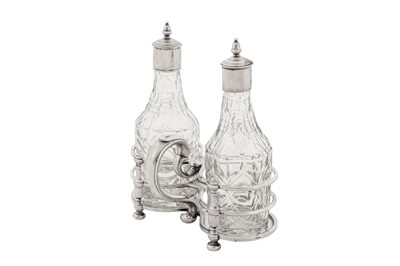 Lot 478 - A Queen Anne Britannia standard silver oil and vinegar cruet, London 1709 by Simon Pantin I (reg. 23rd June 1701)
