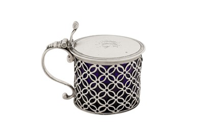 Lot 459 - A George III sterling silver mustard pot, London 1767 by Augustin Le Sage