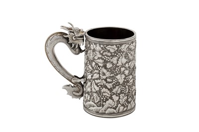 Lot 188 - A late 19th century Chinese export silver mug, Canton circa 1870 retailed by Khecheong