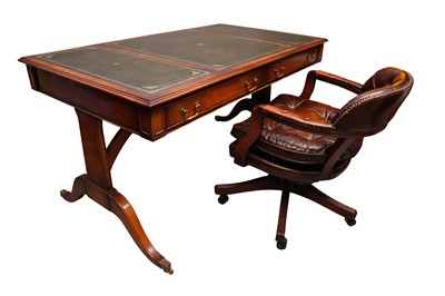 Lot 166 - A REGENCY STYLE MAHOGANY TWO-DRAWER WRITING DESK WITH A LEATHER CAPTAIN DESK CHAIR