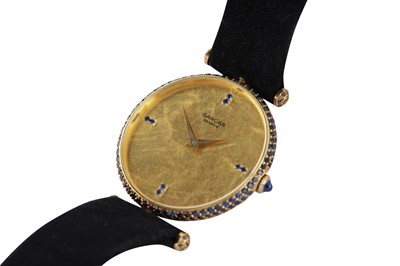 Lot 351 - SARCAR. A GOLD AND SAPPHIRE WRISTWATCH