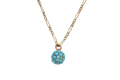 Lot 68 - A TURQUOISE PENDANT AND CHAIN