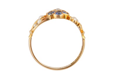 Lot 9 - A SAPPHIRE AND SEED PEARL RING