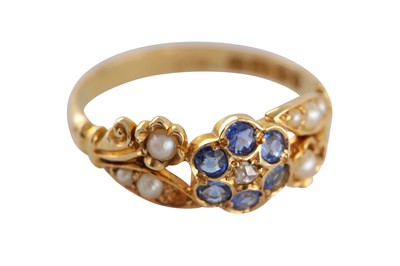 Lot 9 - A SAPPHIRE AND SEED PEARL RING