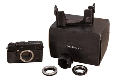 Lot 8 - A Fuji X-Pro 1 Digital Mirrorless Rangefinder Camera with Various Lens Adapters