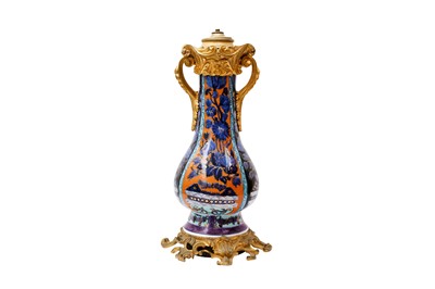 Lot 14 - A CHINESE CLOBBERED BLUE AND WHITE ORMOLU-MOUNTED VASE
