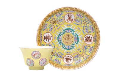 Lot 77 - A CHINESE FAMILLE-ROSE YELLOW-GROUND CUP AND A 'BIRTHDAY' DISH
