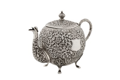 Lot 112 - A late 19th / early 20th century Anglo – Indian unmarked silver three-piece tea service, Cutch circa 1900