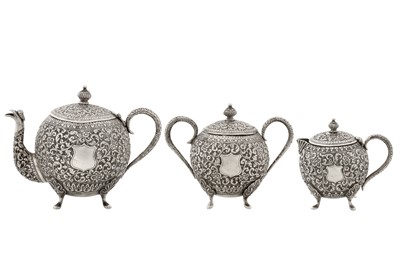 Lot 112 - A late 19th / early 20th century Anglo – Indian unmarked silver three-piece tea service, Cutch circa 1900