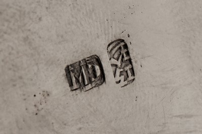 Lot 187 - An early 20th century Chinese export silver three-piece tea service, Canton circa 1920 by Qiao Zhen, retailed by Cum Wo of Hong Kong