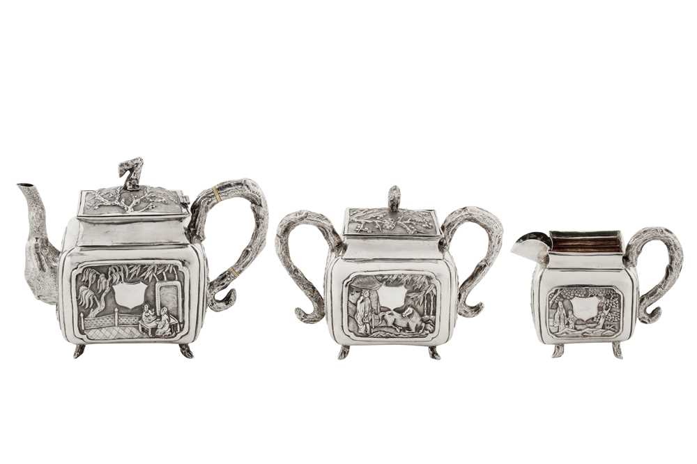 Lot 187 - An early 20th century Chinese export silver three-piece tea service, Canton circa 1920 by Qiao Zhen, retailed by Cum Wo of Hong Kong