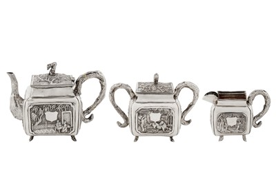Lot 187 - An early 20th century Chinese export silver three-piece tea service, Shanghai circa 1920 by Qiao Zhen, retailed by Cum Wo of Hong Kong
