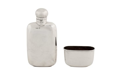 Lot 31 - A George V sterling silver spirit or hip flask, Sheffield 1920 by Walker and Hall