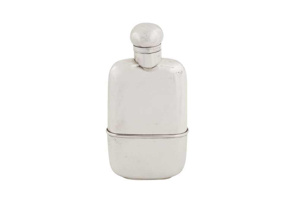 Lot 31 - A George V sterling silver spirit or hip flask, Sheffield 1920 by Walker and Hall