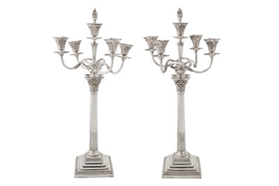 Lot 394 - A pair of Victorian sterling silver five-light candelabra, London 1879 by Richard Hodd and Son