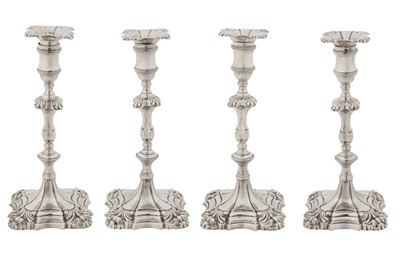 Lot 472 - A set of four George II sterling silver candlesticks, London 1755 by John Cafe