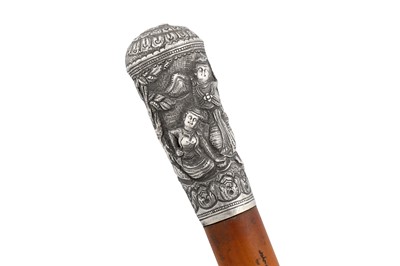 Lot 132 - An early 20th century Burmese unmarked silver walking cane, probably Mandalay circa 1920