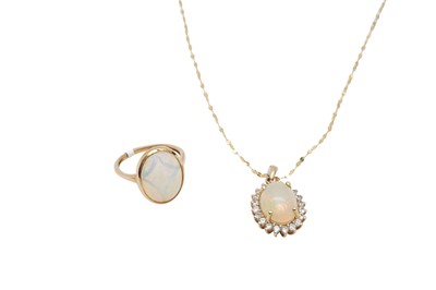 Lot 23 - A WHITE OPAL PENDANT NECKLACE AND A RING