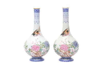 Lot 79 - A PAIR OF SMALL CHINESE FAMILLE-ROSE 'BIRD AND BLOSSOMS' VASES
