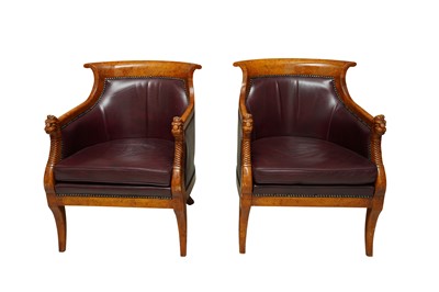 Lot 134 - A PAIR OF EMPIRE STYLE FIGURED BEECH LIBRARY ARMCHAIRS