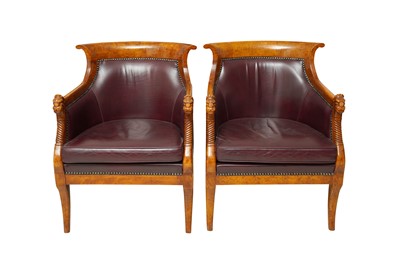 Lot 133 - A PAIR OF EMPIRE STYLE FIGURED BEECH LIBRARY ARMCHAIRS