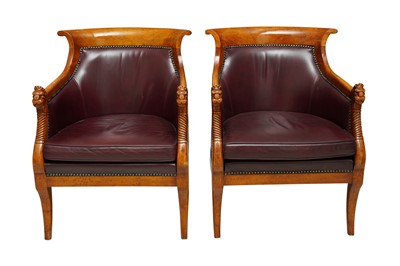 Lot 135 - A PAIR OF EMPIRE STYLE FIGURED BEECH LIBRARY ARMCHAIRS
