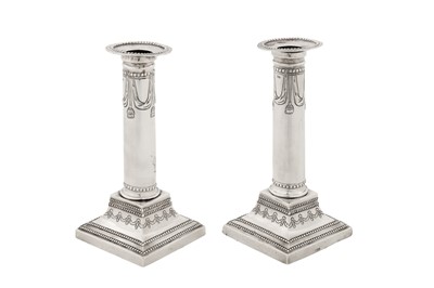 Lot 239 - A pair of late 18th century Sicilian (Italian) silver candlesticks, Palermo 1790 maker’s mark S*A (untraced)