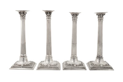 Lot 452 - A set of four early George III sterling silver cast candlesticks, London 1762/63 by John Cafe