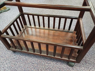 Lot 249 - A CHINESE WOOD LOW TROLLEY