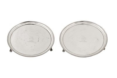 Lot 432 - A pair of George III sterling silver waiters, London 1785 by Thomas Chawner