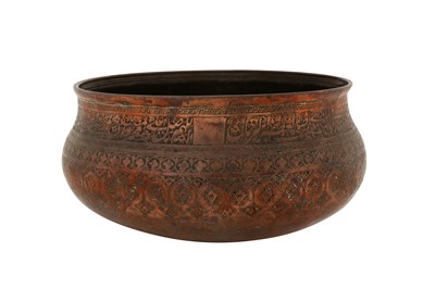 Lot 78 - A 17TH CENTURY SAFAVID ENGRAVED TINNED COPPER TAS BOWL WITH THE NAMES OF THE 12 SHI'A IMAMS