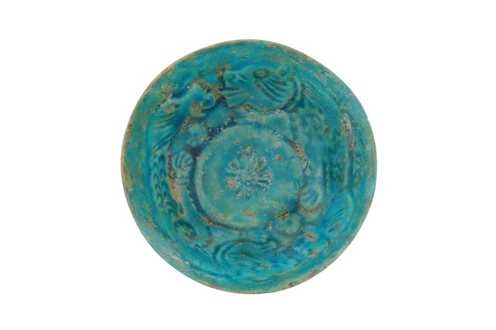 Lot 51 - A 12TH-13TH CENTURY PERSIAN KASHAN TURQUOISE GLAZED POTTERY BOWL