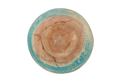 Lot 51 - A 12TH-13TH CENTURY PERSIAN KASHAN TURQUOISE GLAZED POTTERY BOWL