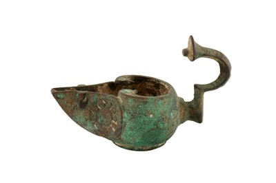 Lot 41 - A 13TH CENTURY PERSIAN SELJUK BRONZE OIL LAMP