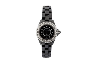 Lot 368 - CHANEL. A BLACK CERAMIC AND DIAMOND J12 WRISTWATCH