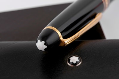 Lot 75 - A MONTBLANC MEISTERSTUCK PIX ROLLERBALL PEN TOGETHER WITH A TRIFOLD MONTBLANC WALLET