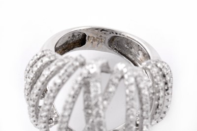 Lot 236 - A DIAMOND MULTI-BAND RING