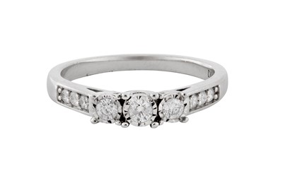 Lot 221 - A THREE-STONE DIAMOND RING