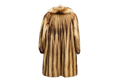 Lot 438 - A FITCH FUR COAT