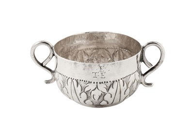 Lot 490 - A Commonwealth sterling silver small porringer or caudle cup, London 1656 by John Cruttall (free 1655, d.c. 1695)