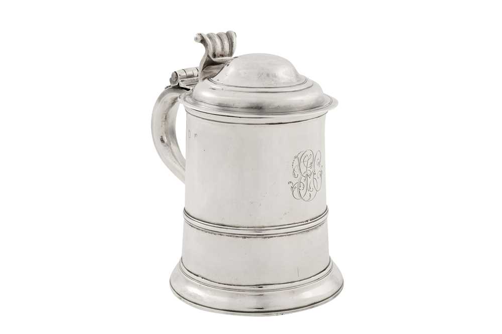 Lot 469 - A George II sterling silver half-quart or pint tankard, London 1738 by Francis Spilsbury I (reg. 24th July 1729)